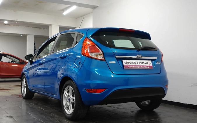 Ford Fiesta cena 26900 przebieg: 166556, rok produkcji 2013 z Wołów małe 781